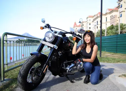 May posing with her Motorcycle